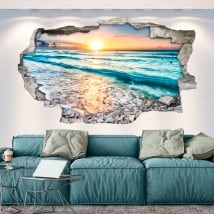 Vinilos agujero pared atardecer en la playa 3d
